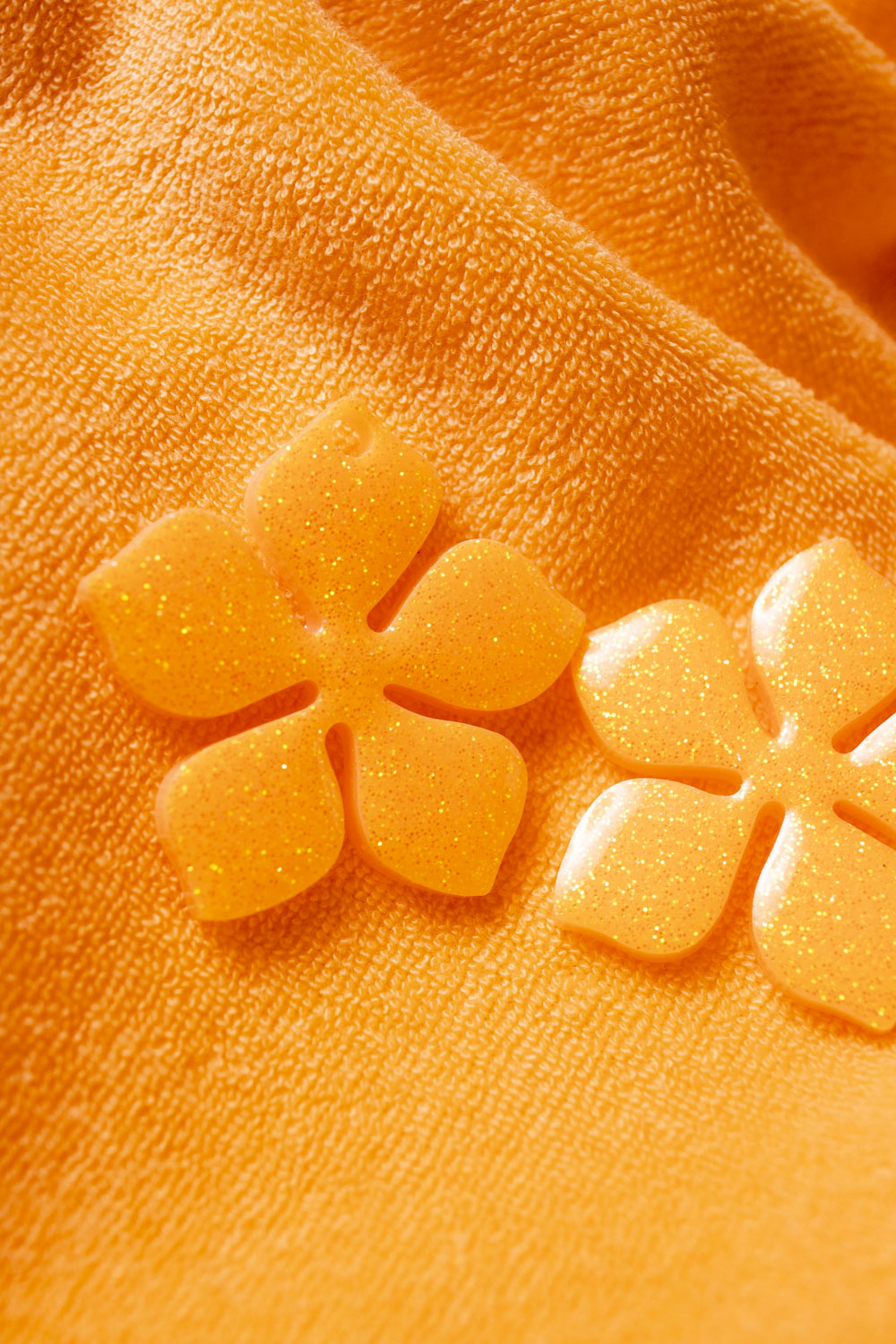 Pampilles interchangeables oranges Ă paillettes fluo.