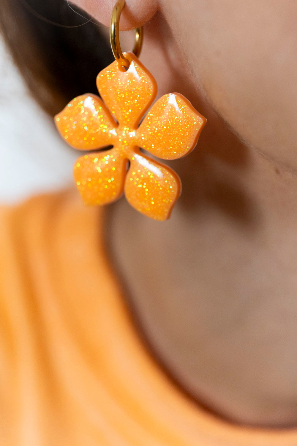 Pampilles interchangeables oranges Ă paillettes fluo.