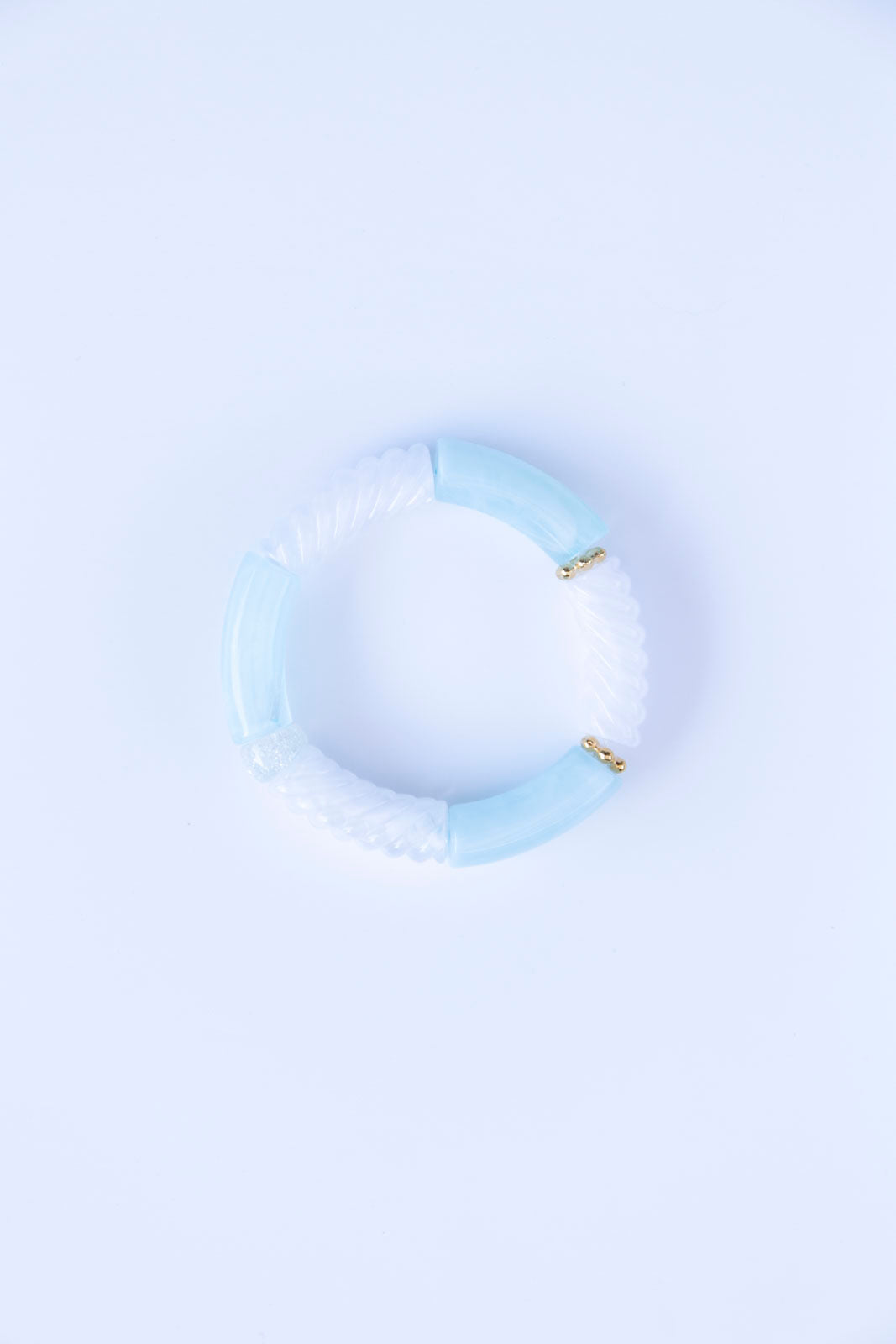 bracelet élastique à enfile. Fait à la main. Perles tubulaires. 