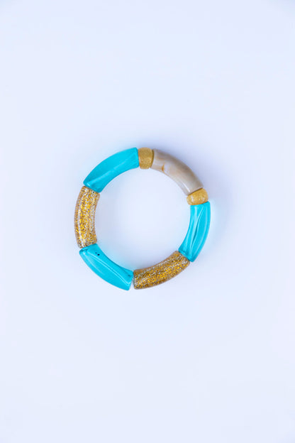 bracelet élastique à enfile. Fait à la main. Perles tubulaires. 