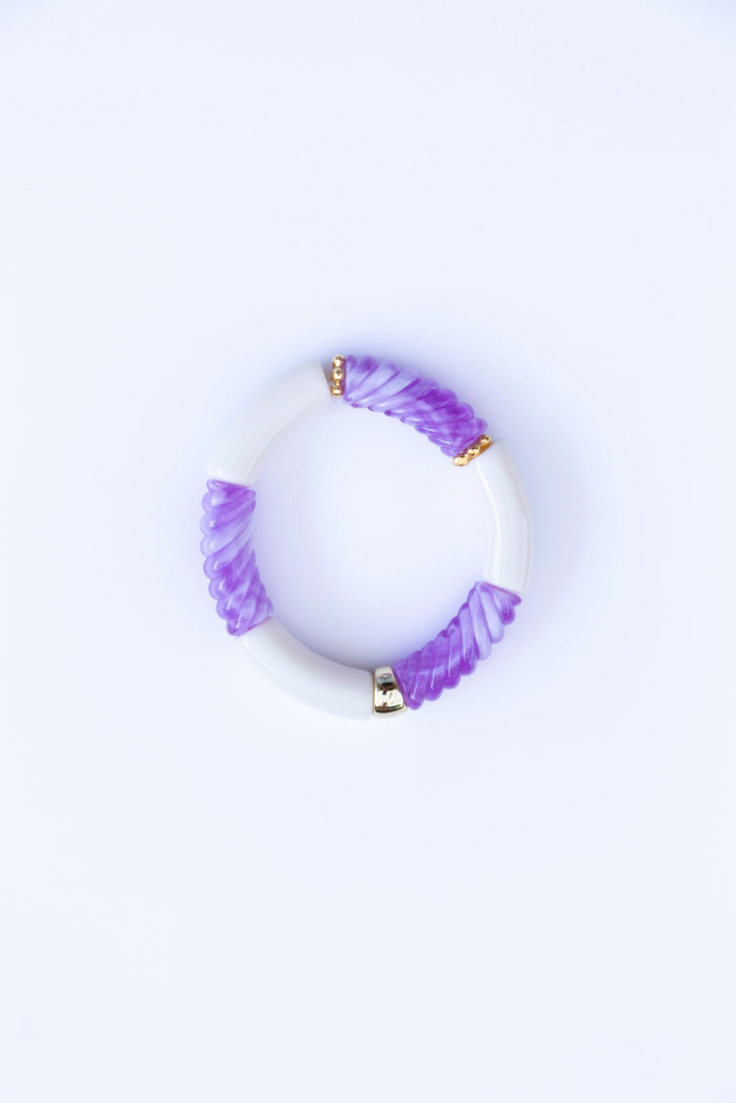 bracelet élastique à enfile. Fait à la main. Perles tubulaires. 