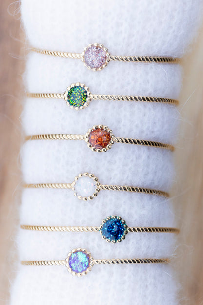 Bracelet jonc fin réglable pailleté. Kaki, vert, doré, cuivré. Automne. Cabochon. Atelier Rézane. Résine. Fait main. Pays basque. Acier inoxydable.