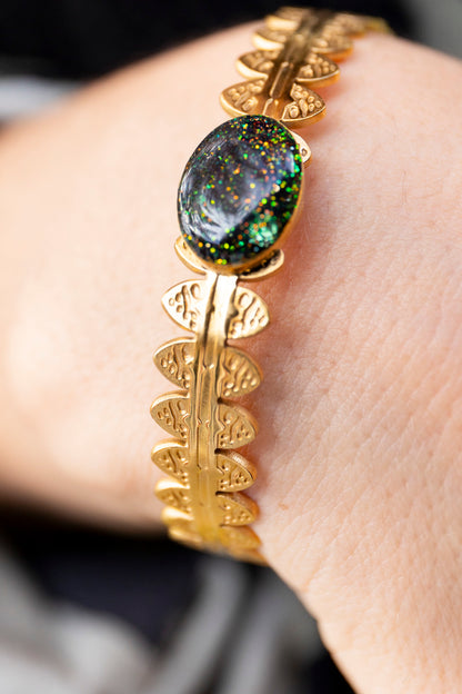 Bracelet jonc réglable pailleté. Kaki, vert, doré, cuivré. Automne. Cabochon. Atelier Rézane. Résine. Fait main. Pays basque.