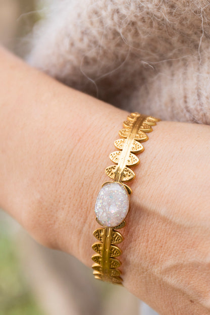 Bracelet jonc réglable pailletté. Blanc, doré, givré,holographique. Automne. Atelier Rézane. Résine époxy. Fait main. Pays basque. Acier inoxydable.