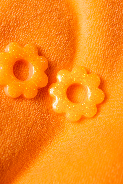 Pampilles interchangeables oranges à paillettes fluo.