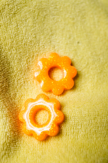 Pampilles interchangeables oranges à paillettes fluo.
